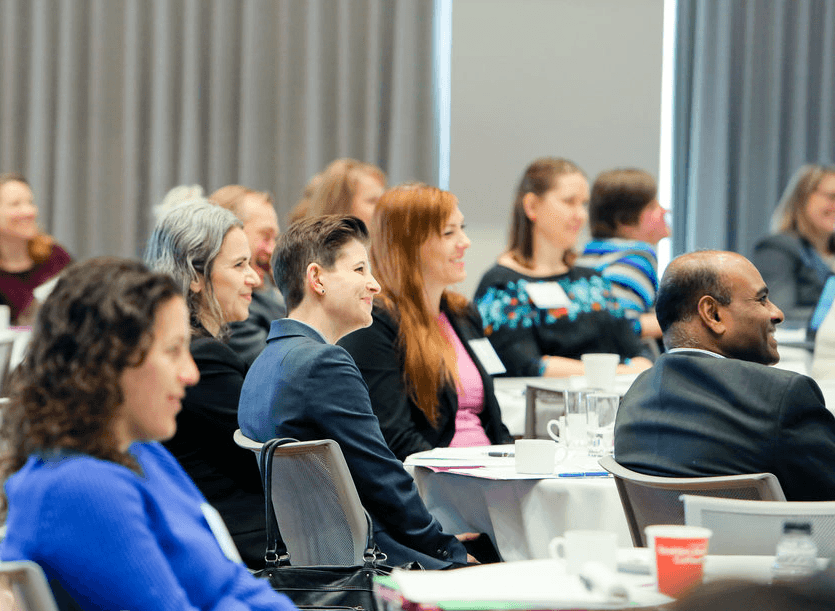 people at a symposium